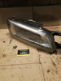 Koplamp rechts Nissan Almera N15 26010-1N826 (26010-1N726) Gebruikt.