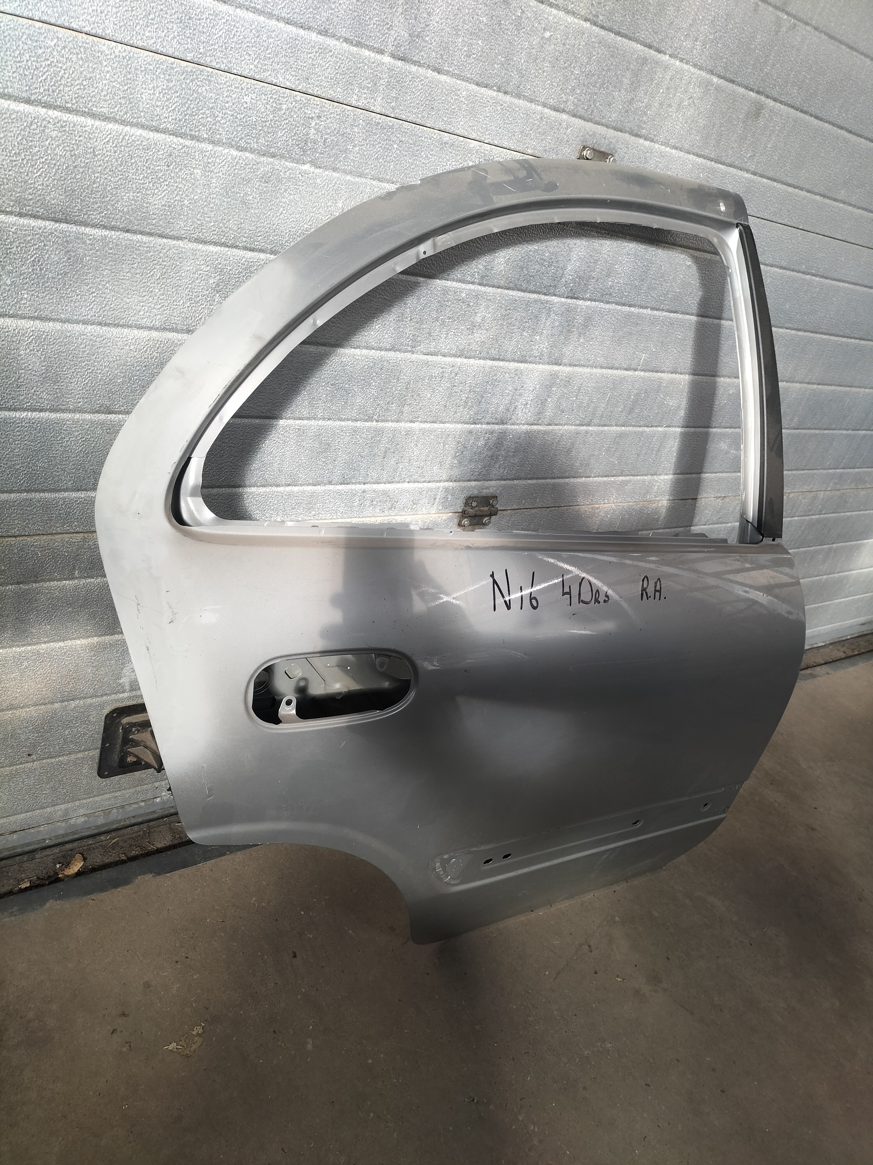 Door-rear, right-hand Nissan Almera N16 sedan 82100-9M730 gray.