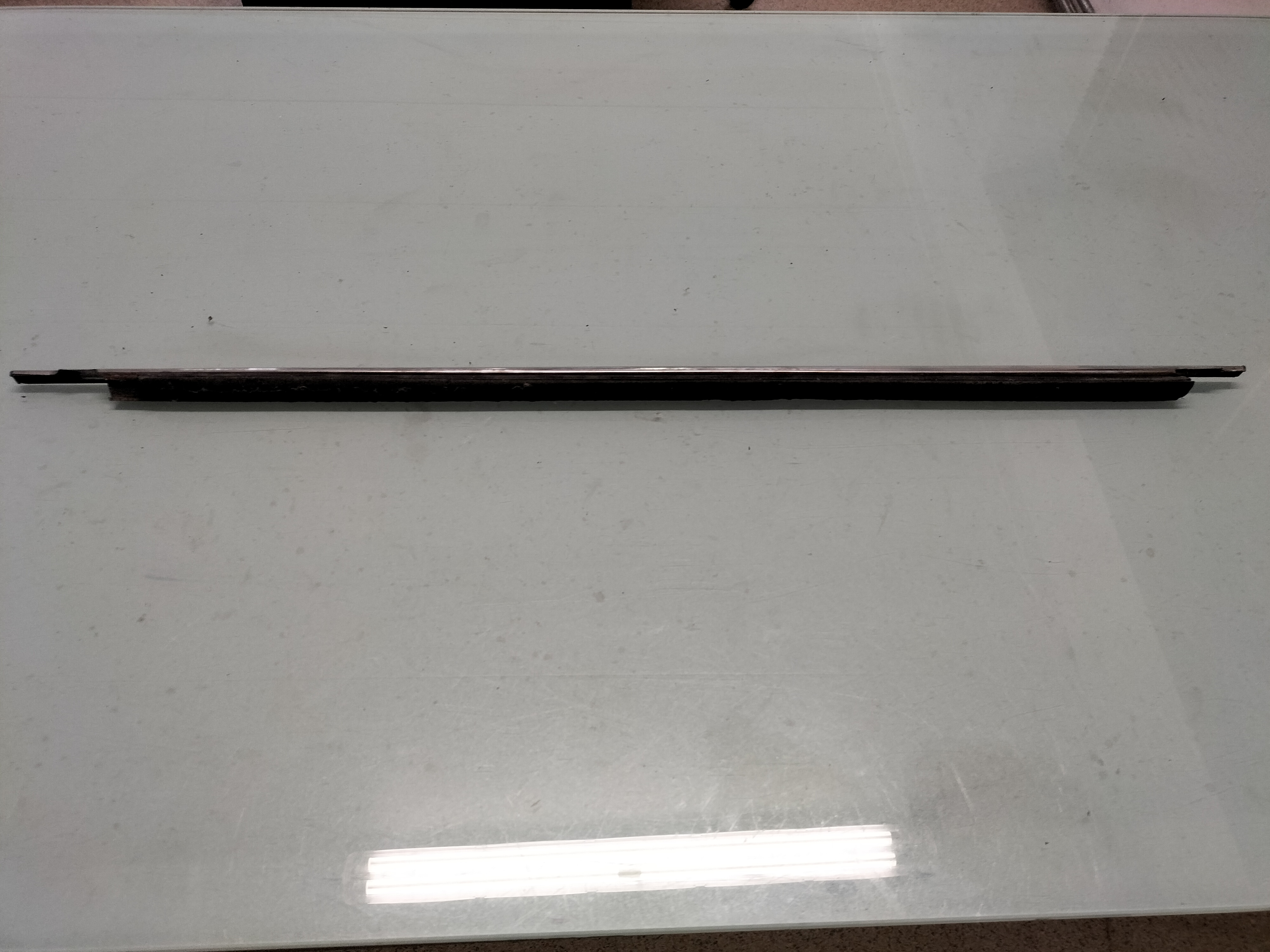 Assy-weatherstrip waist, front left-hand Datsun Cherry E10 80319-M0204 Used part.
