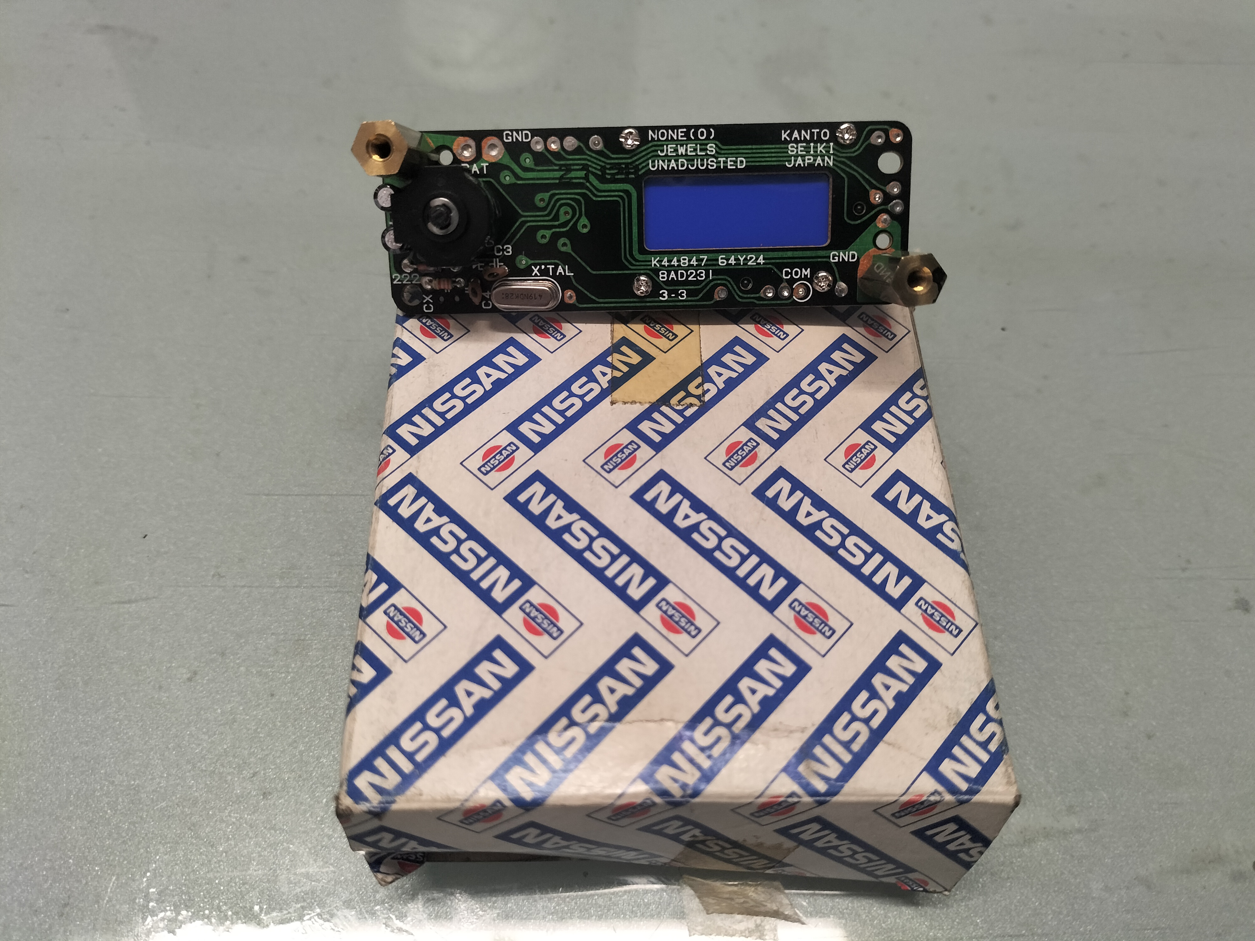 Digital clock Nissan 25820-64Y24 Original