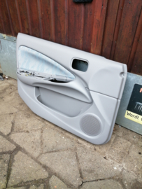 Deurpaneel linksvoor Nissan Almera N16 80901-5M400 (Japan - uitvoering)