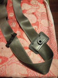 Veiligheidsgordelspanner linksvoor Nissan Micra K11. Bestuurder. 86845-4F100