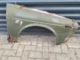 Zijscherm rechts Datsun Cherry E10 63100-M1001 Schade.