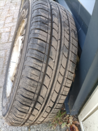 13 inch stalen velgen met band 175/70R13 40300-4F400 (20260712) Nissan Micra K11. Gebruikt.