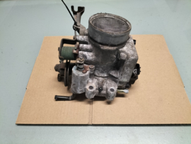Gasklephuis Nissan Micra K11 16119-0U020 Gebruikt.