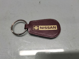 Sleutelhanger Nissan lederen opdruk. Kleur: donkerrood (auto Heemskerk) 20251021 Nieuw.