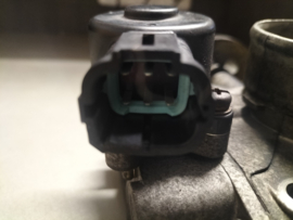 Gasklephuis QG18DE Nissan 16119-7J602 N16/ P11/ V10/ WP11 Gebruikt.