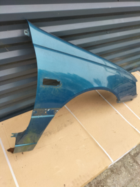 Zijscherm rechts Nissan Sunny N14 (FK1) 63100-62C30 Gebruikt.