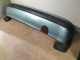 Achterbumper Nissan Micra K11 85022-50B00 (DK6) Gebruikt.