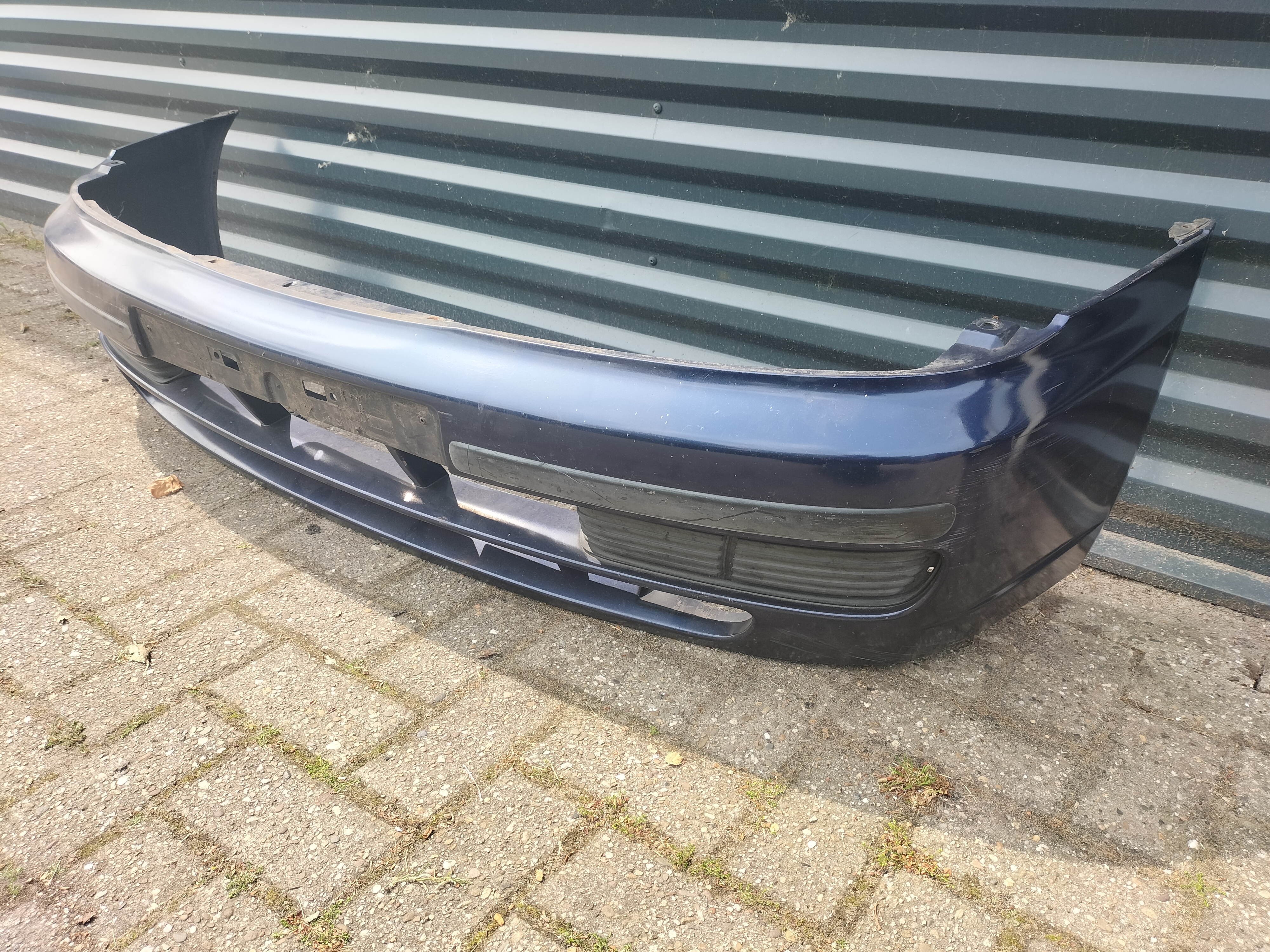 Fascia kit-front bumper Nissan Almera N15 62022-0N025 Used part.