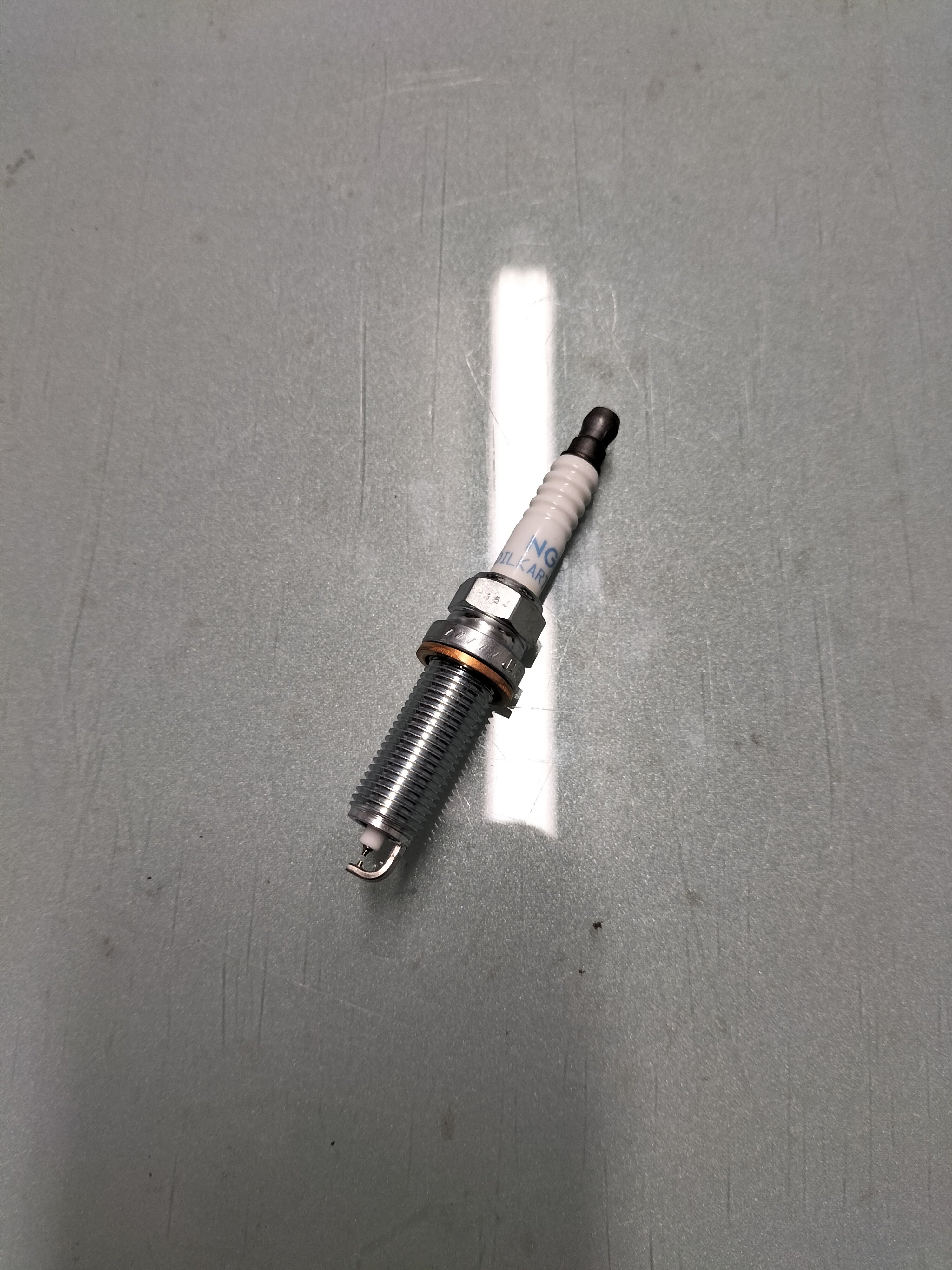 Spark plug Nissan 22401-1TT1C Original ( DILKAR7E9HS )