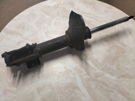 Shock absorber rear left-hand Nissan Primera P10 55303-71J25 Used part..