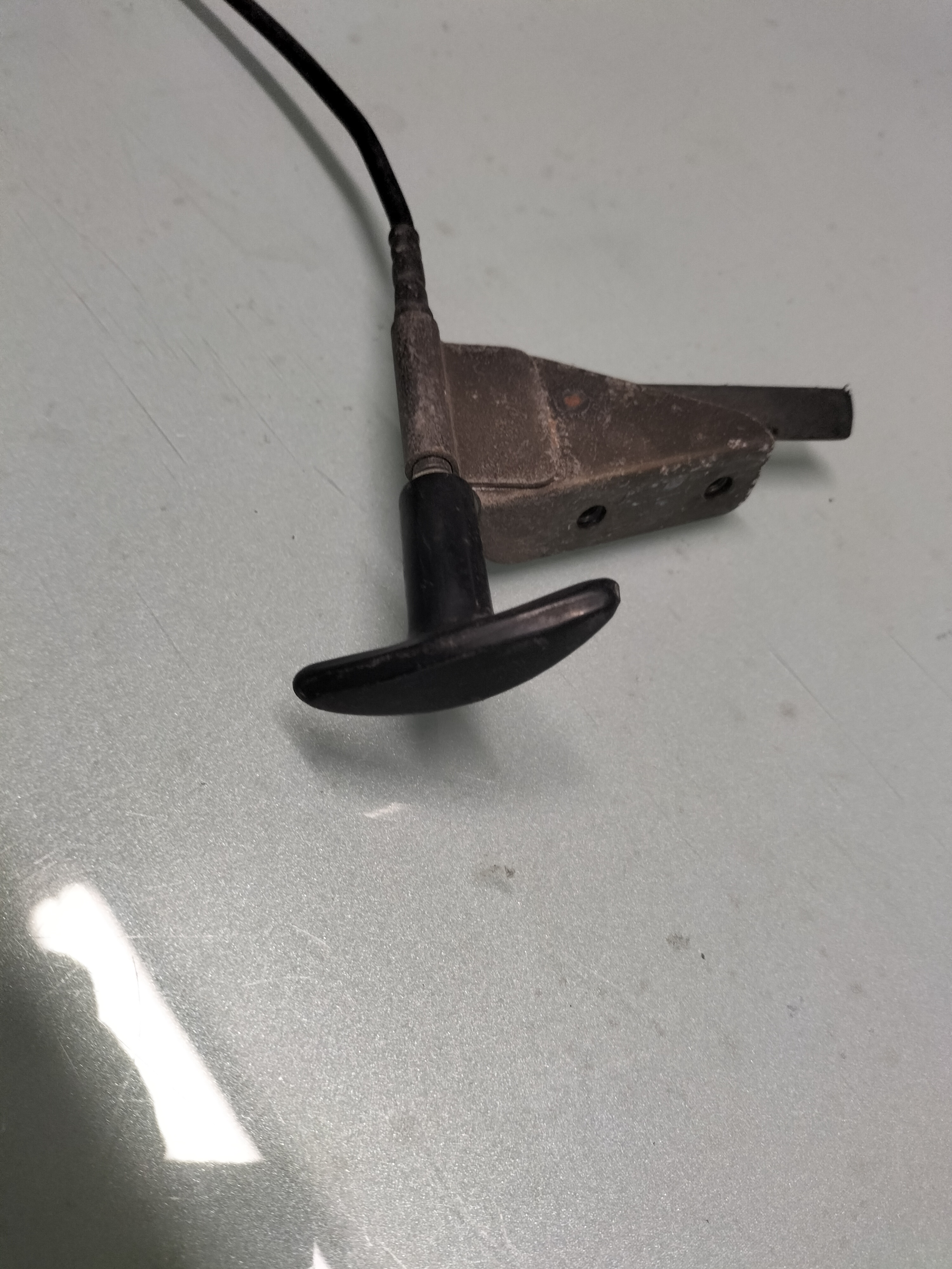 Assy-control, hood lock Datsun Cherry E10 65660-M1003 Used part.