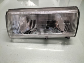 Koplamp links Nissan Sunny B12 Wagon B6060-60A01 Origineel.