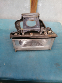 Lamp with housing head lamp left-hand Nissan 300ZX Z31 26060-07P00 used part.
