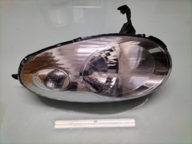 Headlight left Nissan 26060-AX700 Original.