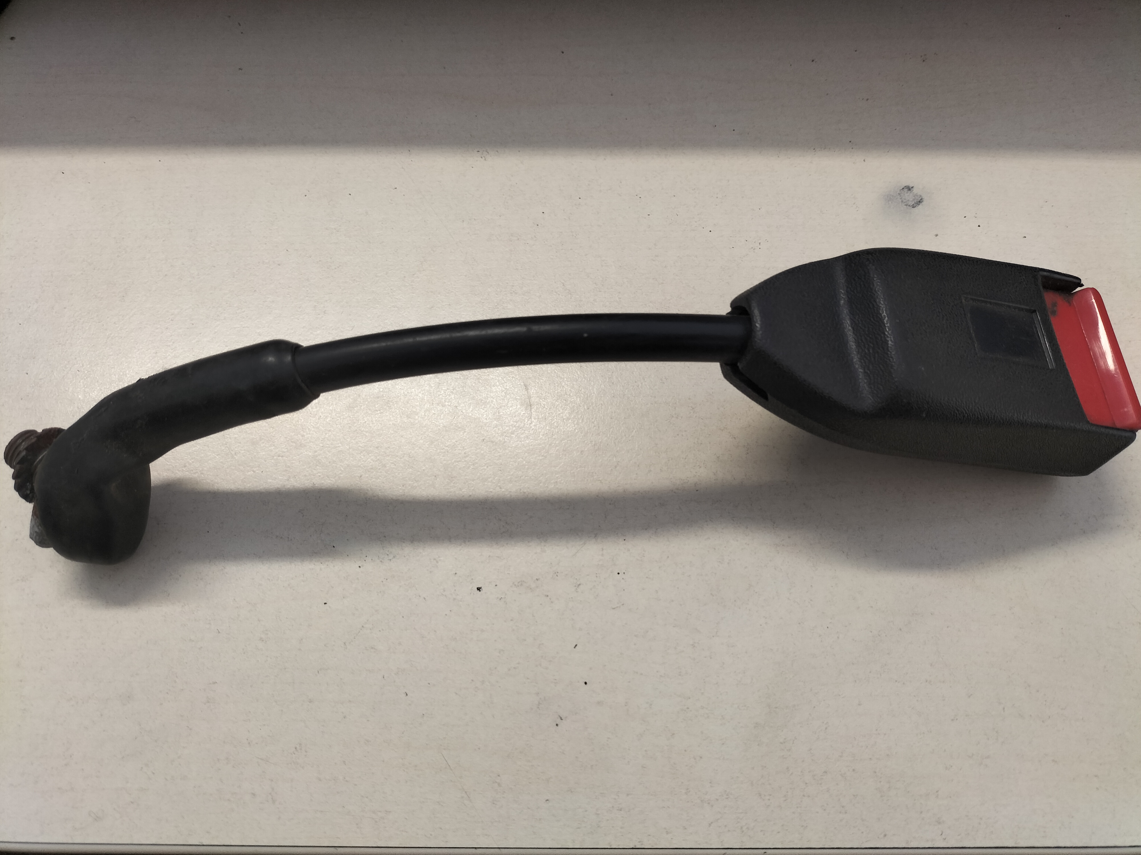Belt front seat buckle, left-hand Datsun Cherry E10 86843-M0200 Used part.