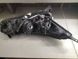 Koplamp links Nissan Micra K14 26060-5FA0A Gebruikt, lichte schade.