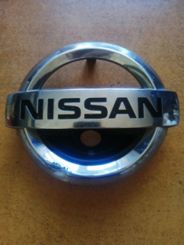 Grille-embleem Nissan X-Trail T32 62890-4BA0A Schade.