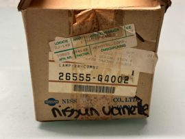 Achterlicht links Nissan Vanette C120 26555-G4002 Origineel.