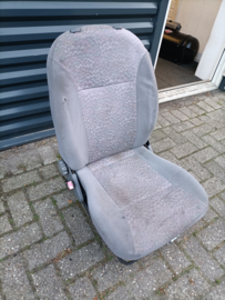 Bestuurdersstoel Nissan Micra K11 87050-5F510 Gebruikt. Lichte schade.