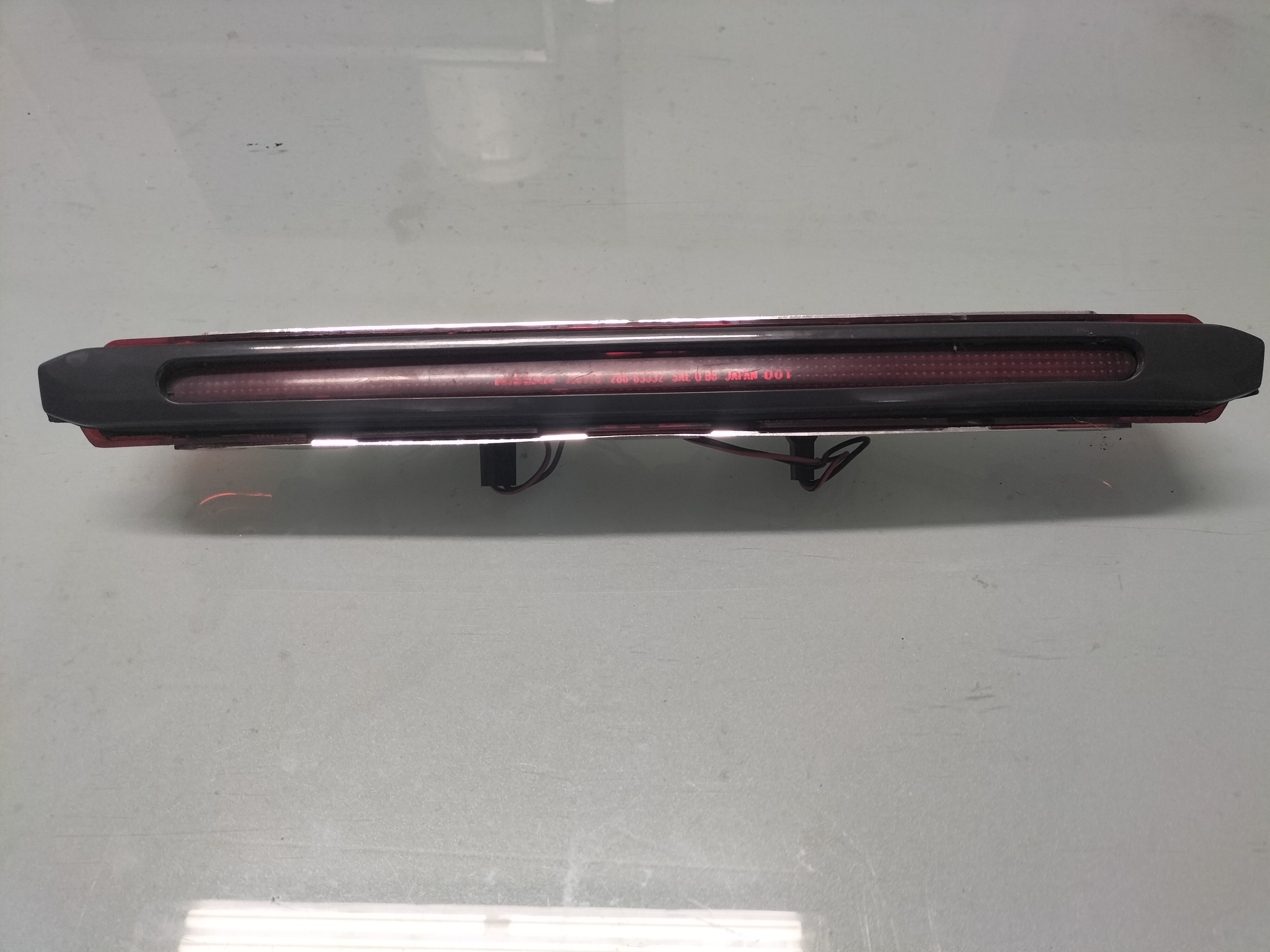 Derde remlicht Nissan 100NX B13 26590-67Y00 Gebruikt.
