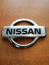 Emblem-trunk lid Nissan Almera Tino V10 84890-BU300 Used part.