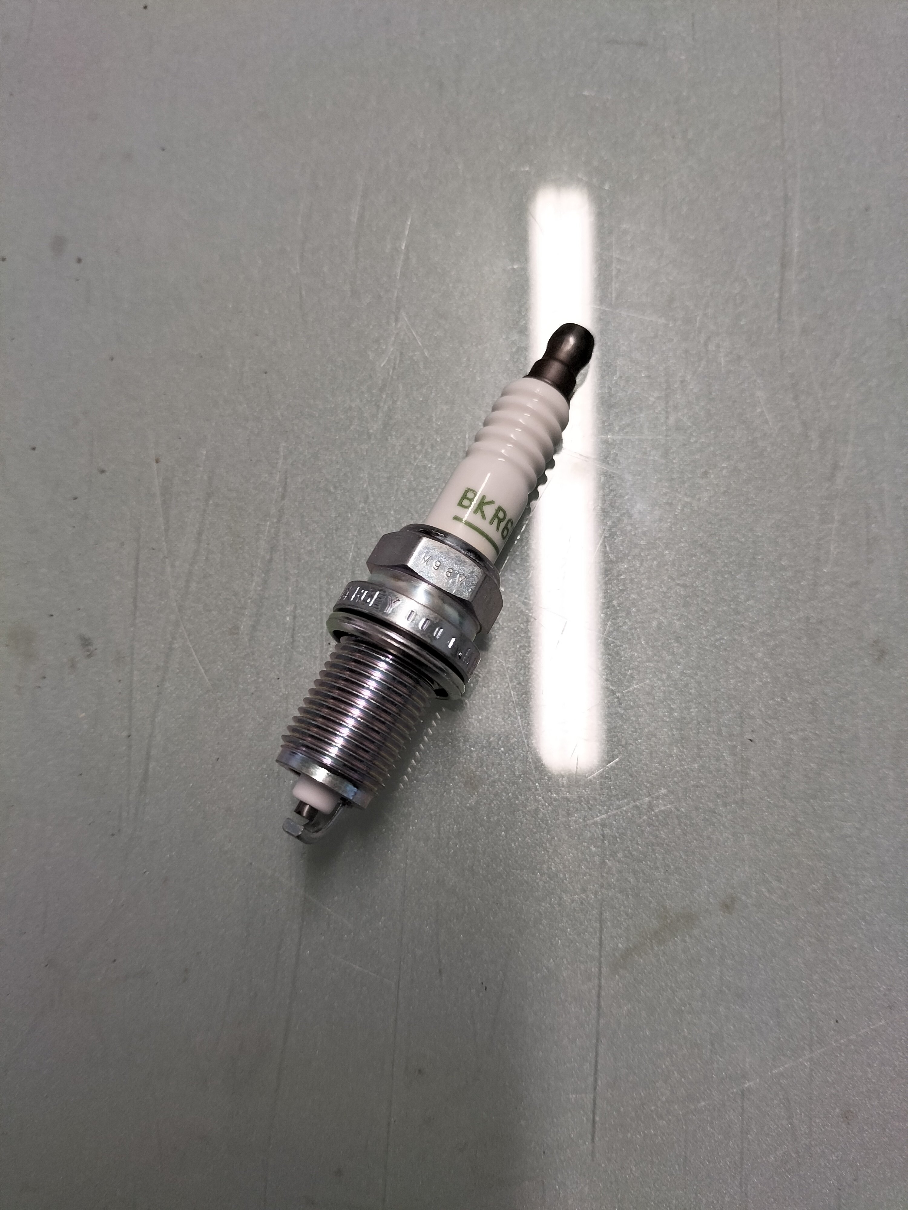 Spark plug Nissan 22401-53J06 ( BK6REY ) Original.