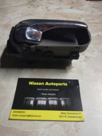Chromen deurgreep binnenzijde rechts Nissan 80670-9F500 N16/ P11/ V10/ WP11 Gebruikt.