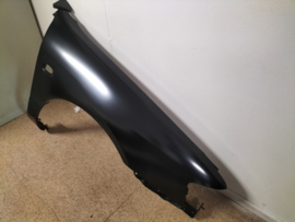 Zijscherm rechts Nissan Primera P11 63100-2J030 Nieuw.