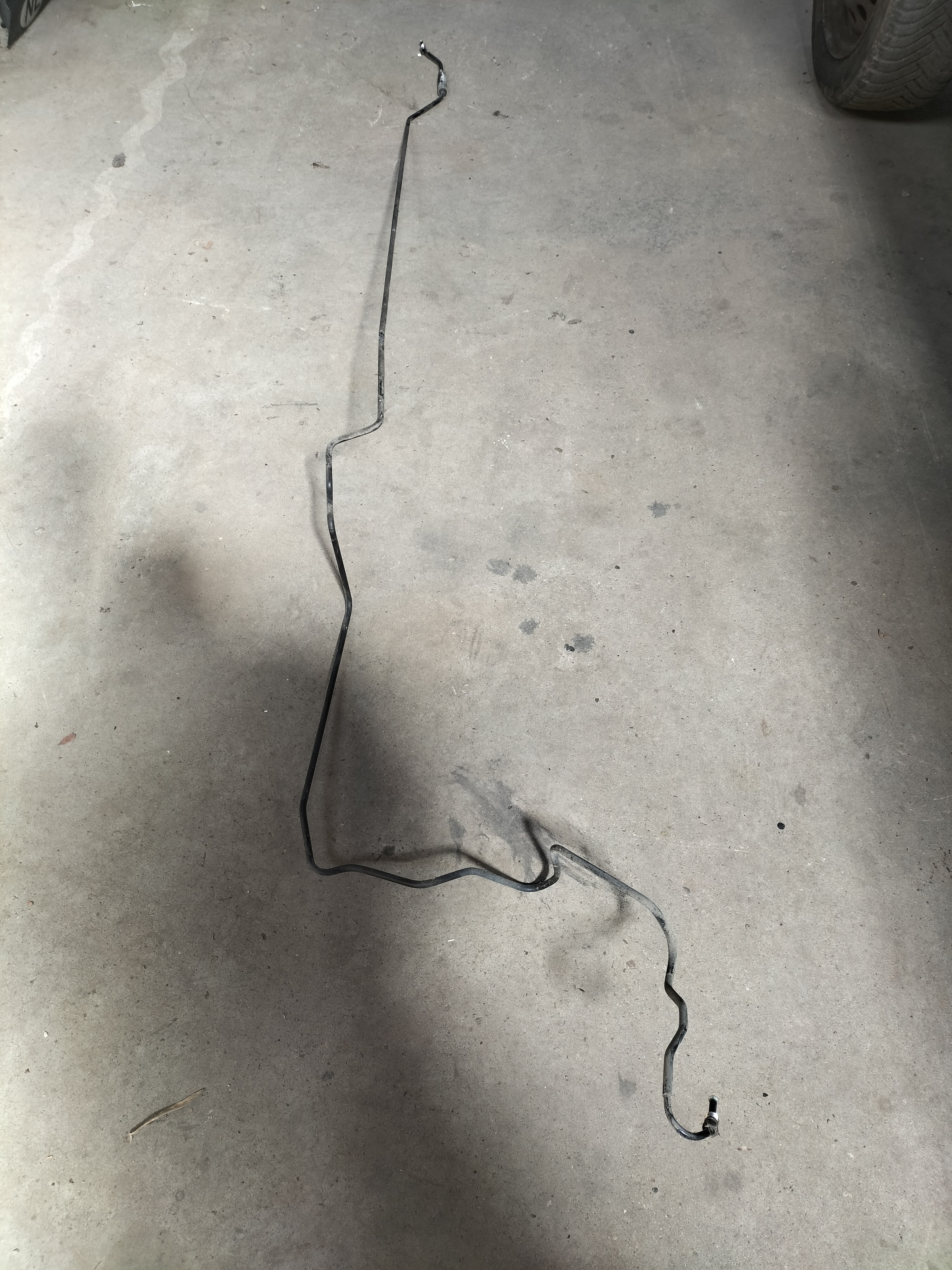 Remleiding linksachter Nissan Micra K14 46285-5FA1A Gebruikt.