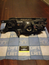 Koplamp rechts Nissan Almera N15 26010-1N825 (26010-1N725) Gebruikt, lichte schade.