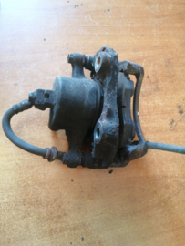 Caliper front left-hand, without pads or shims Nissan Bluebird 41011-31E01 T72/ U11 Used part.
