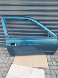 Portier rechtsvoor Nissan Sunny N14 80100-73C30 (FK1) 3-deurs Gebruikt.