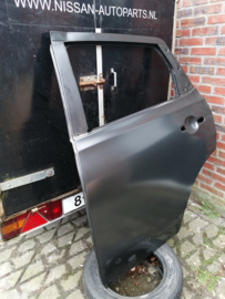 Portier linksachter Nissan Qashqai J10 H2101-JD0M0 Lichte schade/ Origineel.