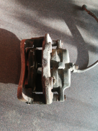 Caliper front left-hand, without pads or shims Nissan Terrano2 R20 41011-7F00A Used part.