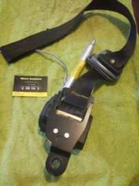 Belt tongue, pretensioner front left-hand Nissan Micra K11 86885-6F810 Used part.