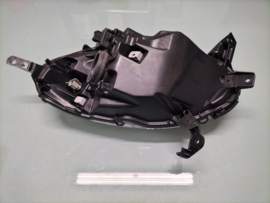 Headlight left Nissan 26060-AX700 Original.