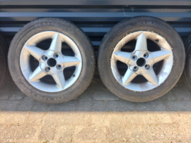 14 inch aluminium velgen met band 175/65R14 Nissan 40300-51C26 B13/ N14/ Y10 (20250520) Gebruikt.