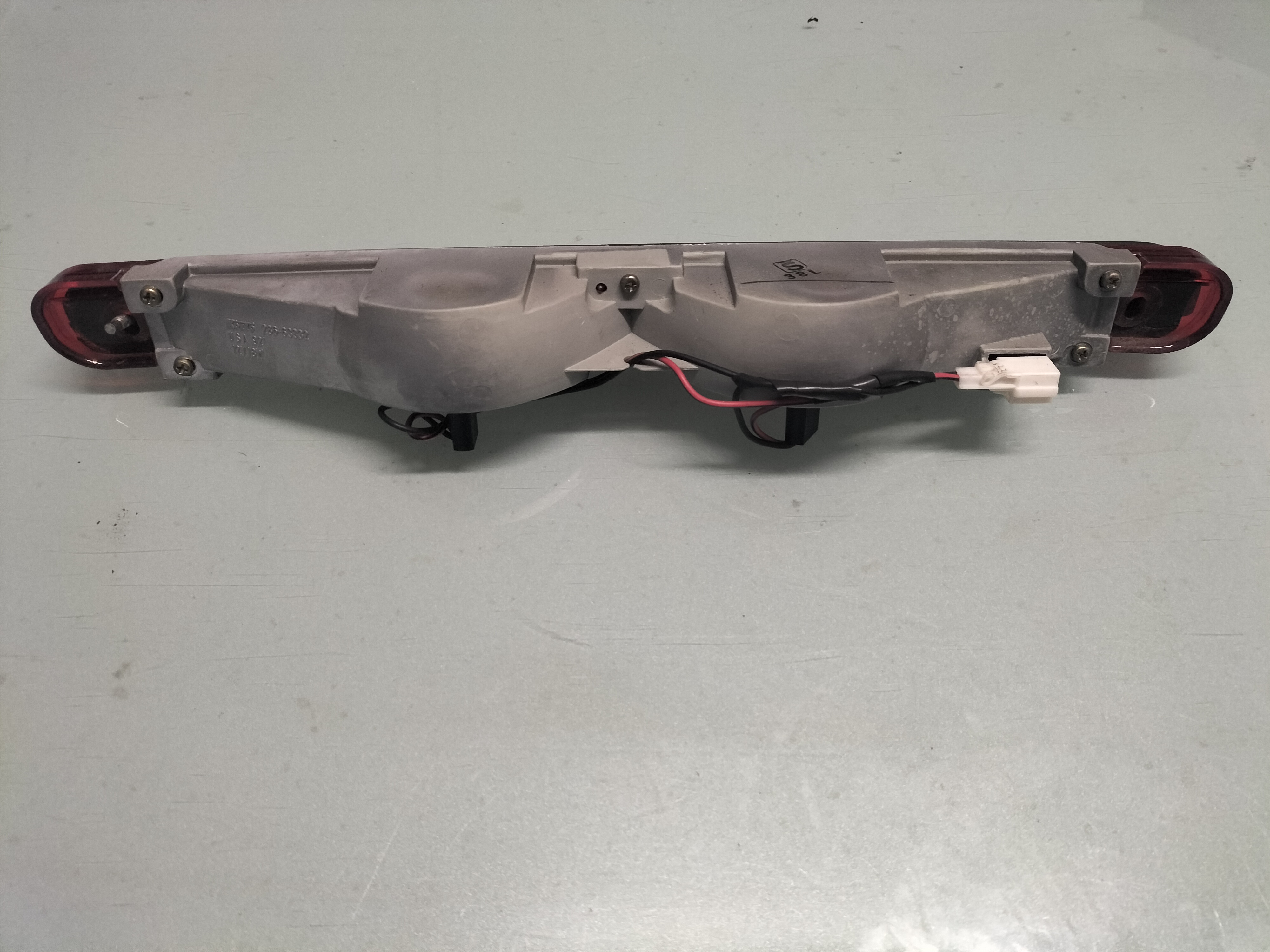Lamp stop, high mounting Nissan 100NX B13 26590-67Y00 Used part.