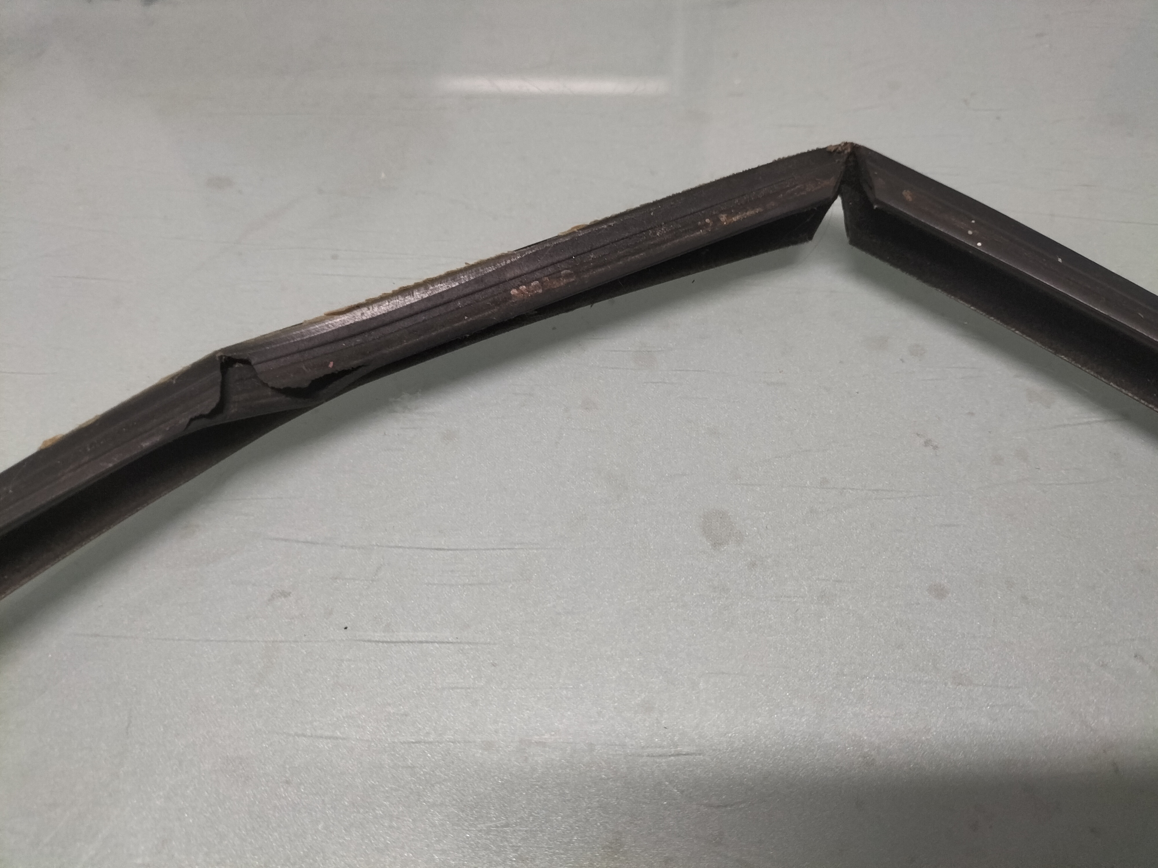 Assy-glass run ''a'' Datsun Cherry E10 4-doors sedan 82337-M0303 Used part.
