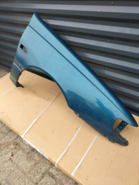 Zijscherm rechts Nissan Sunny N14 (FK1) 63100-62C30 Gebruikt.