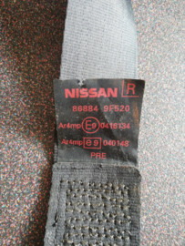 Veiligheidsgordelspanner bijrijder Nissan Primera P11/WP11 86884-9F520 Gebruikt.