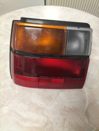 Achterlicht links Nissan Micra K10 26555-04B65 (20250327) Lichte schade.