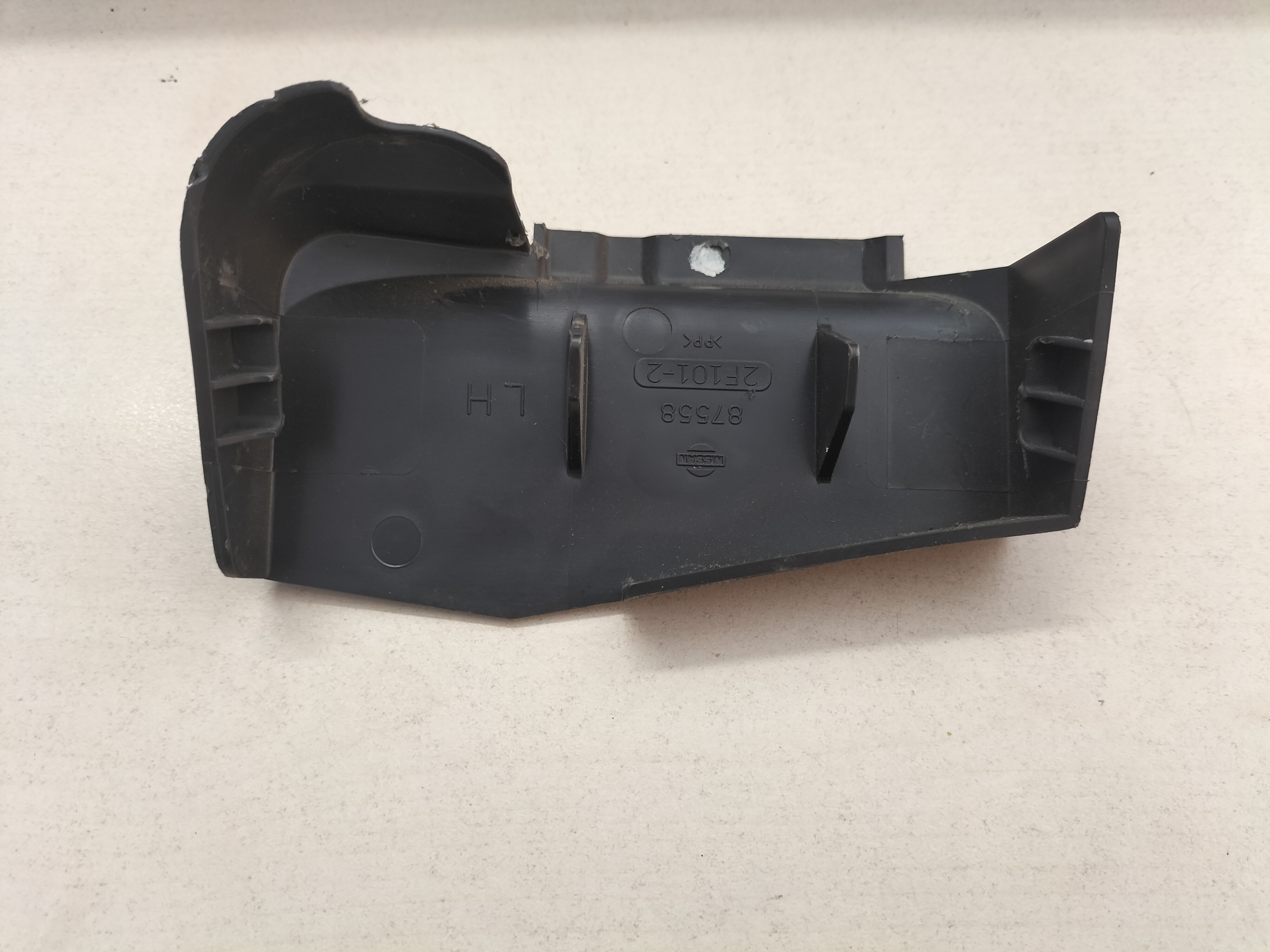Cover-seat slide Nissan Primera P11 87558-2F102 Used part.