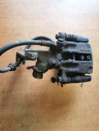 Caliper rear left-hand, without pads or shims Nissan Primera P11/ WP11 44011-8F800 Used part.