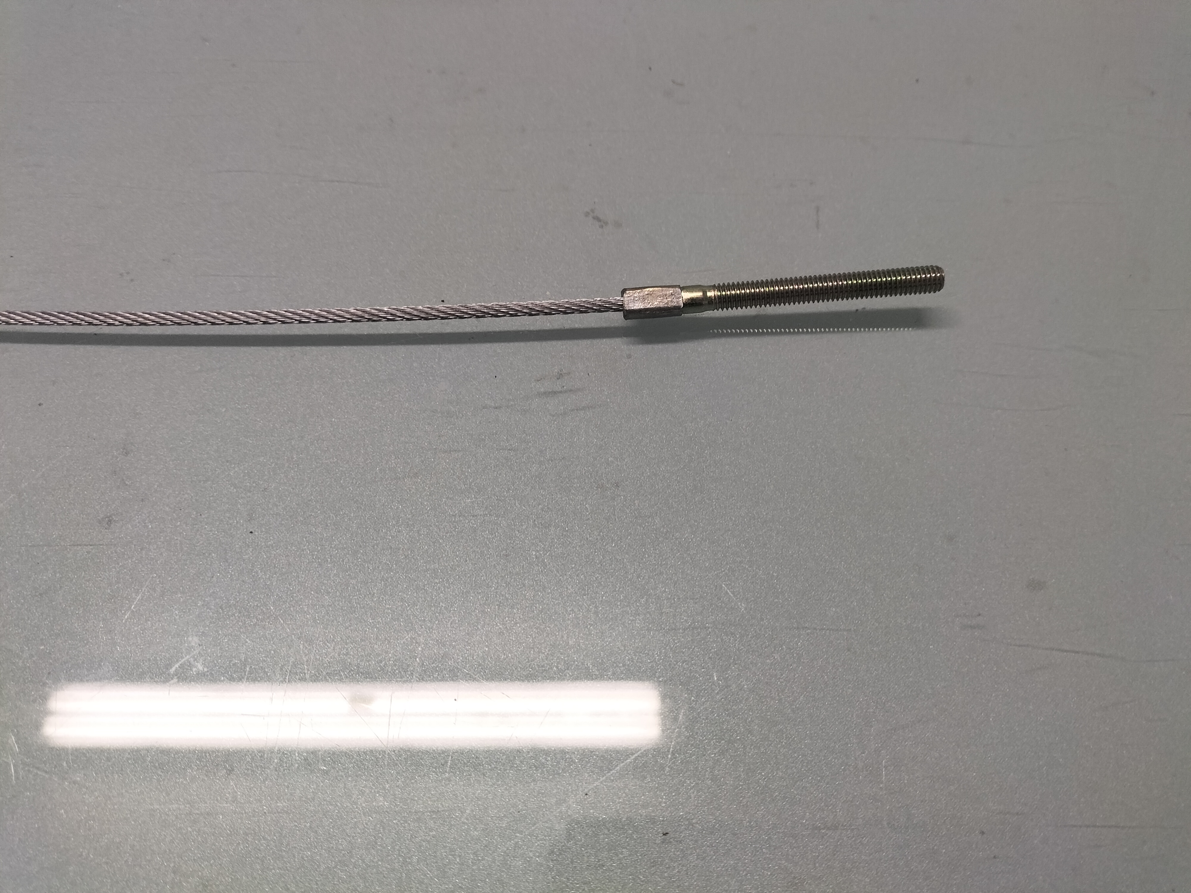 Handrem Kabel Nissan 36450-M0201 Origineel.