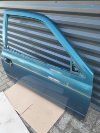 Portier rechtsvoor Nissan Sunny N14 80100-73C30 (FK1) 3-deurs Gebruikt.