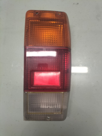 Achterlicht rechts Nissan 26520-G4002 Koito 220-52422R Gebruikt. Schade.