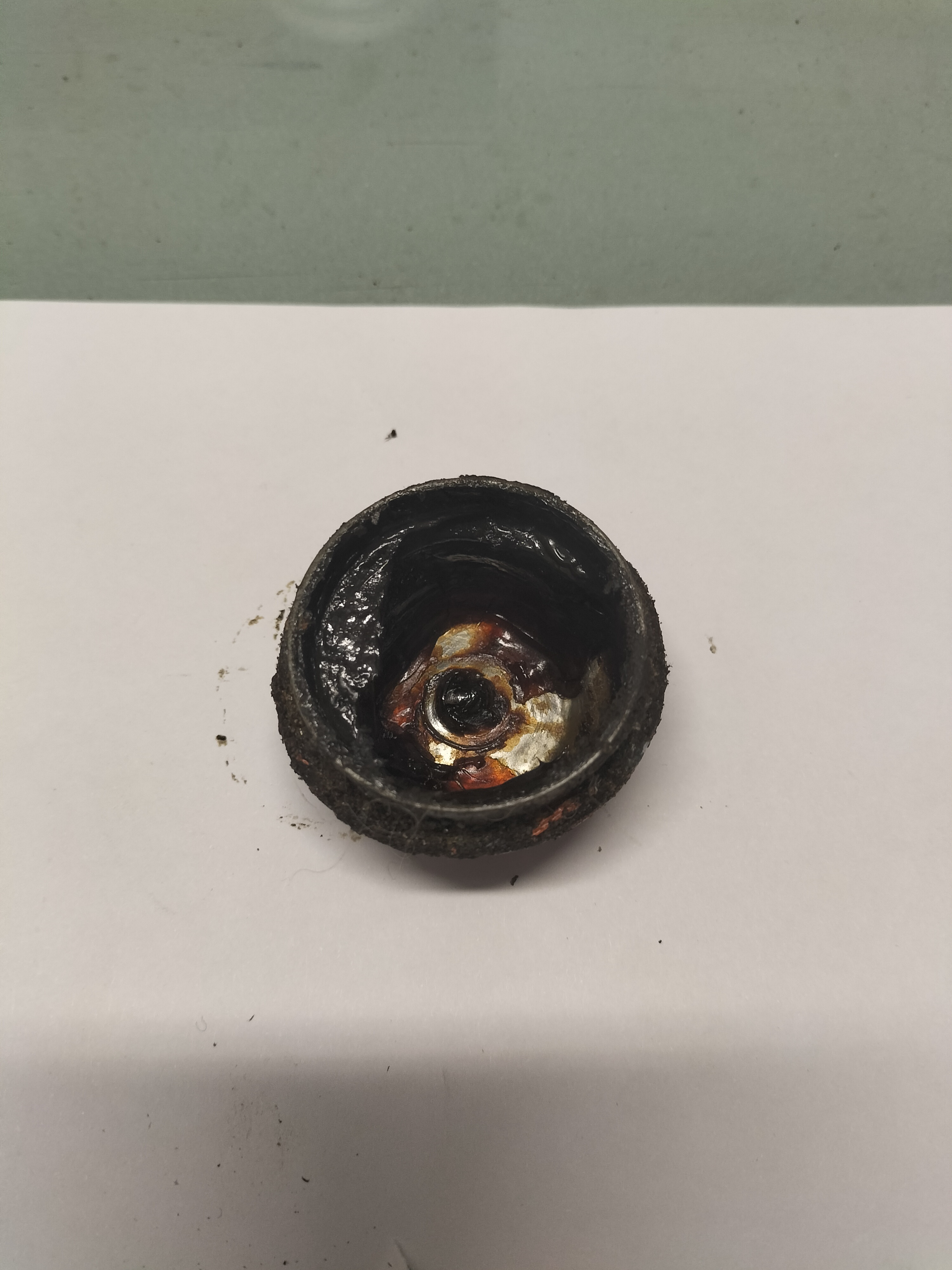 Naafdop achteras Datsun Cherry E10 40234-18000 Gebruikt.